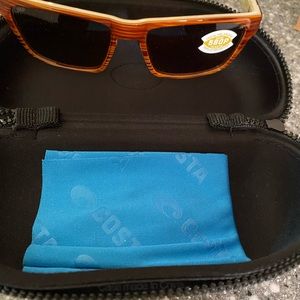 Costa Hinano sunglasses.  Never been worn
